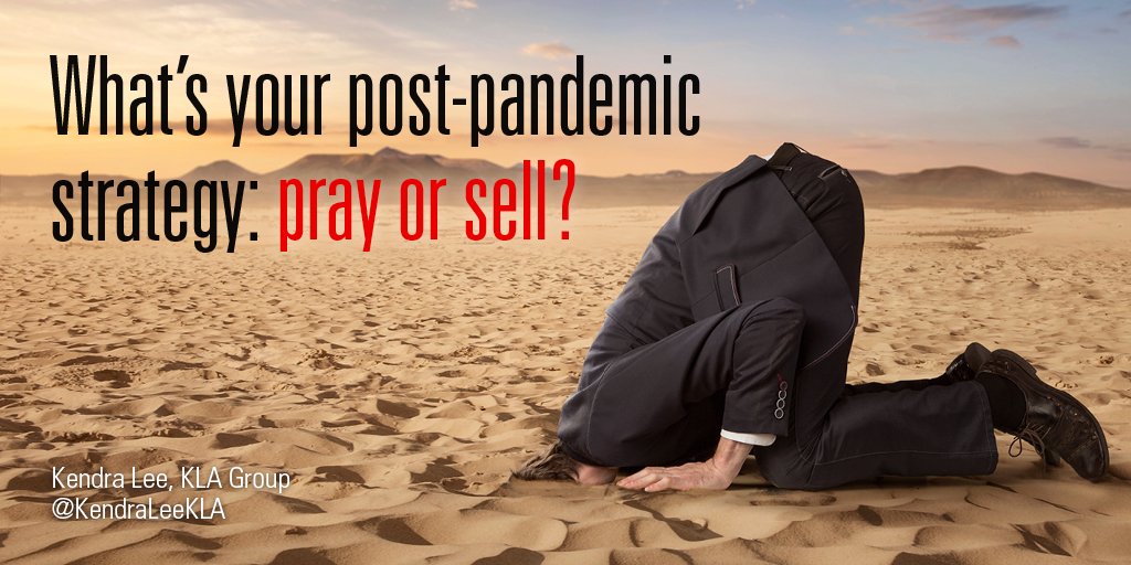 Businessman in black suit with head buried in the sand in the desert