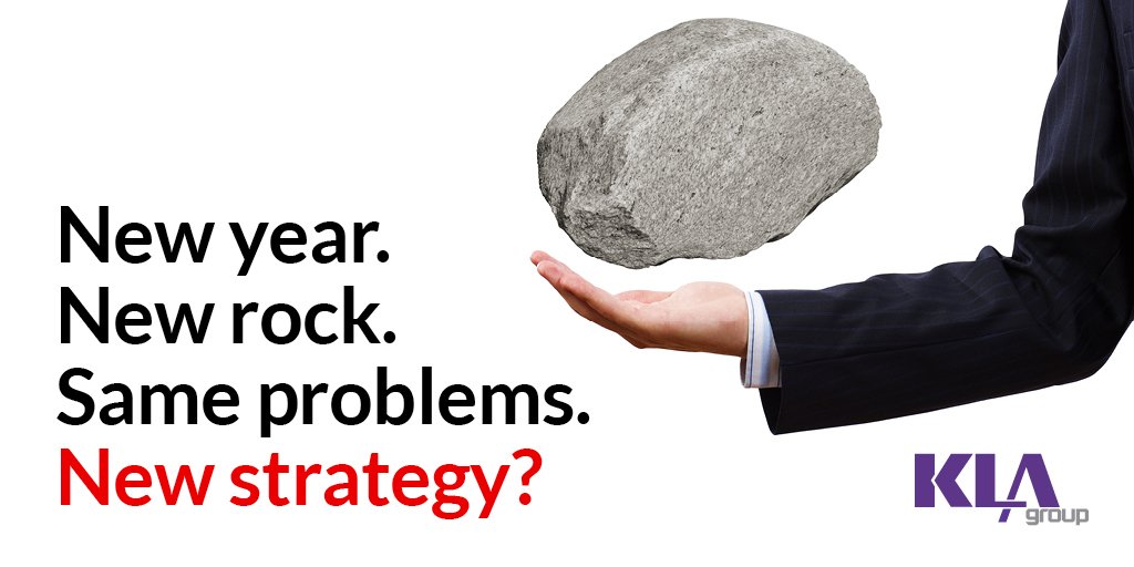 businessperson juggling boulder