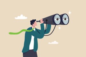 businessman using binoculars