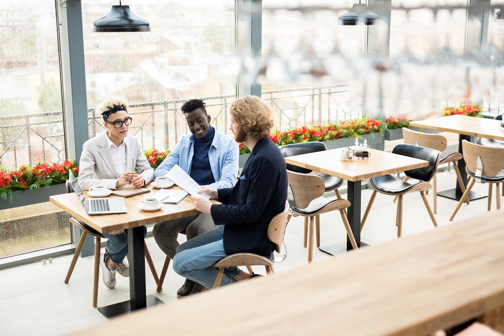 Marketing team working with a Fractional CMO to prevent stalled efforts and gain leadership for scalable B2B growth